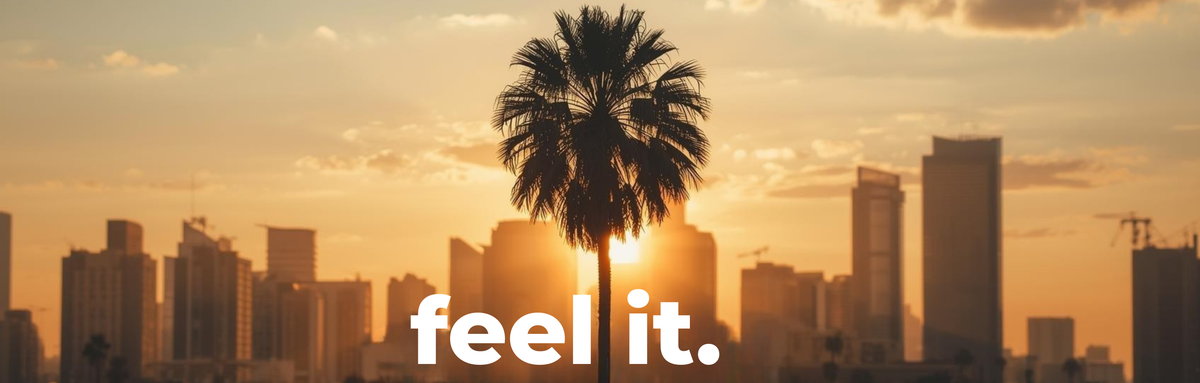 feel it. logo over a palm tree and city skyline at sunset, unisex fleece jogger sets from Melbourne